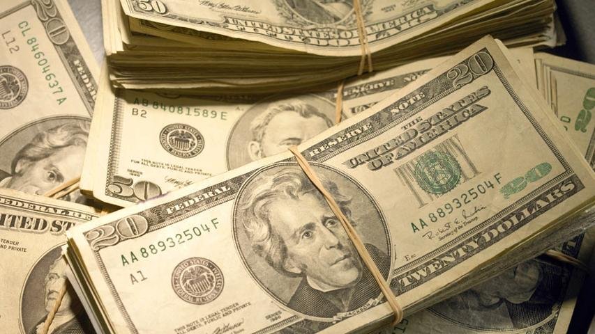 Por que é tão difícil prever as cotações do dólar?