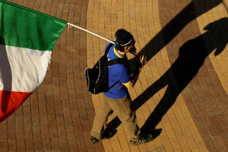 A dívida soberana da Itália cresceu 114 bilhões de euros nos primeiros 11 meses de 2012, incluindo 23 bilhões em contribuições do país aos fundos de resgate europeus (Ezra Shaw/Getty Images)