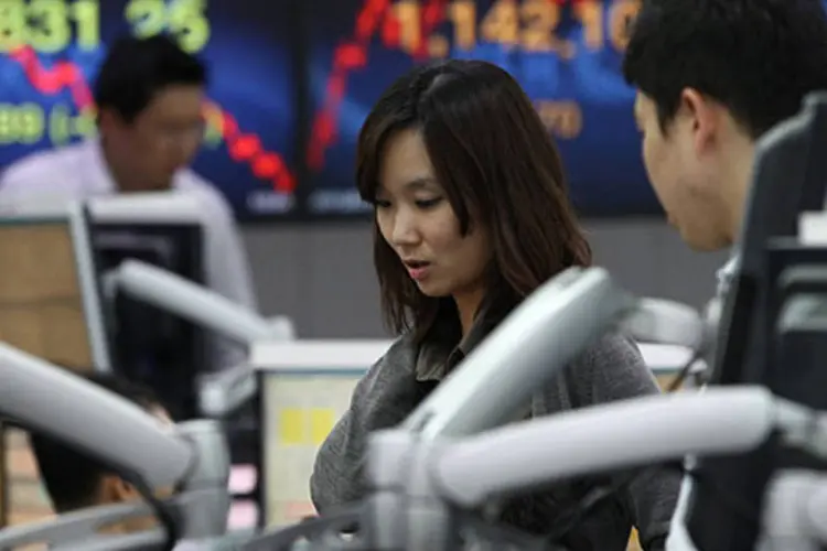 
	Kospi: o &iacute;ndice sul-coreano recuou 0,71%, a 1.927,21 pontos
 (SeongJoon Cho/Bloomberg)