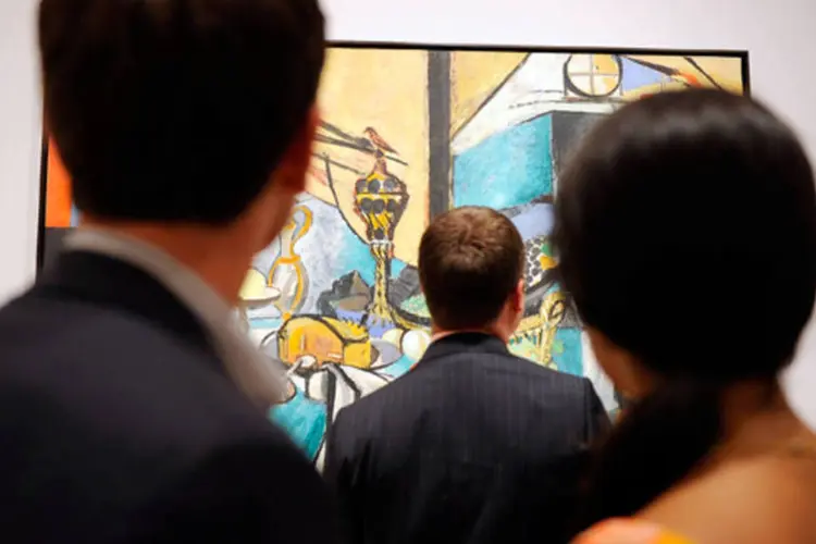 Visitantes olhando a uma pintura de Henri Matisse no Museu de Arte Moderna de Nova York (Jemal Countess/Getty Images)