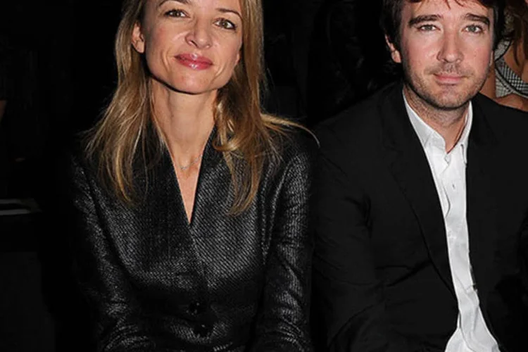 
	Delphine Arnault e Antoine Arnault durante desfile da Louis Vitton: Delphine, de 38 anos, parece a mais prov&aacute;vel sucessora entre os dois
 (Pascal Le Segretain/Getty Images)
