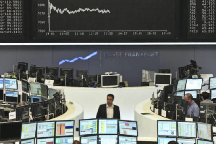 
	Bolsa: o setor de recursos b&aacute;sicos, sens&iacute;vel ao crescimento, ca&iacute;a 3,6 por cento, enquanto as a&ccedil;&otilde;es dos bancos recuavam 2,97%
 (Hannelore Foerster/Bloomberg)