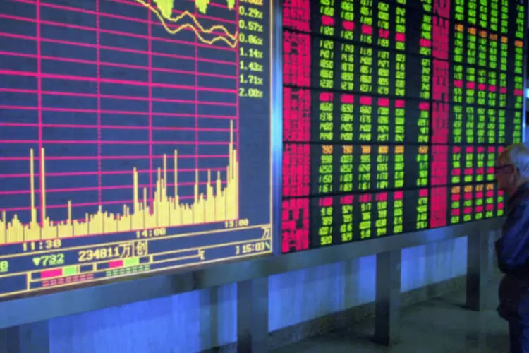 
	Bolsa de Xangai: movimenta&ccedil;&atilde;o &eacute; um al&iacute;vio para investidores ansiosos para por seu capital para trabalhar
 (Kevin Lee/Getty Images)