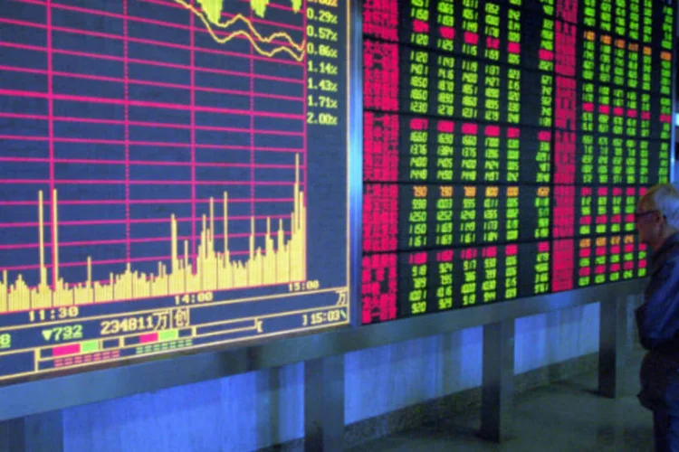 
	Bolsa de Xangai: &agrave;s 7h59, o &iacute;ndice MSCI que re&uacute;ne a&ccedil;&otilde;es da regi&atilde;o &Aacute;sia-Pac&iacute;fico com exce&ccedil;&atilde;o do Jap&atilde;o avan&ccedil;ava 0,18 por cento
 (Kevin Lee/Getty Images)