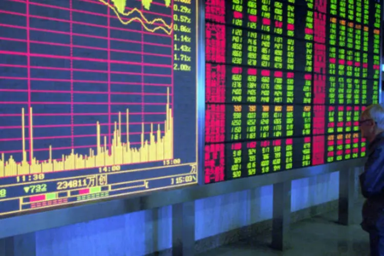 
	Bolsa de Xangai: o &iacute;ndice Xangai Composto subiu 1,4%, para 2.282,87 pontos, e o &iacute;ndice Shenzhen Composto ganhou 1,7%, aos 1.002,54 pontos
 (Kevin Lee/Getty Images)
