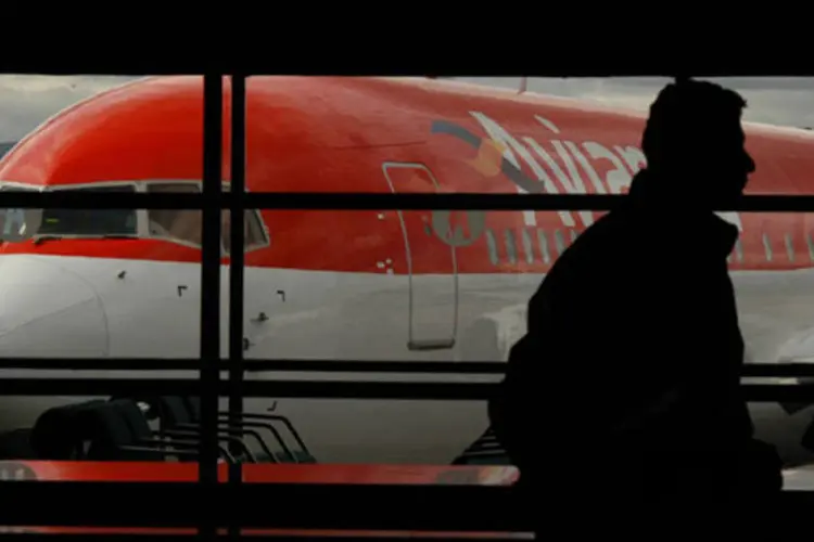 
	Passageiros aguardam voo: a estimativa da SAC &eacute; de que os editais para a realiza&ccedil;&atilde;o de obras nos aeroportos comecem a ser lan&ccedil;ados no primeiro trimestre de 2014
 (Diego Giudice/Bloomberg News)