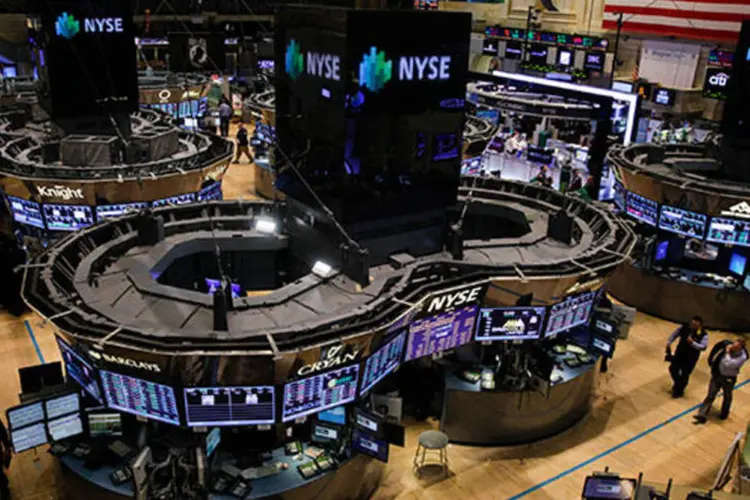 
	NYSE: balan&ccedil;os e not&iacute;cias corporativas t&ecirc;m influenciado comportamento dos investidores, dizem analistas
 (Jin Lee/Bloomberg)