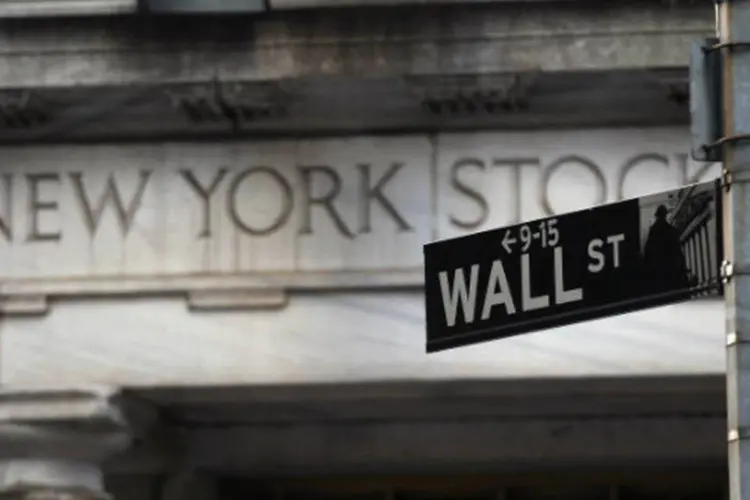 
	Wall Street: principal indicador da bolsa acumulou oito dias consecutivos com m&aacute;ximos hist&oacute;ricos.
 (John Moore/Getty Images)