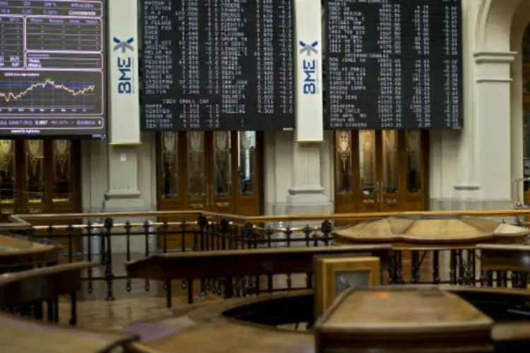 
	Bolsa de Madri: em Madri a queda foi mais expressiva, devido ao temor com a volatilidade na Am&eacute;rica Latina, onde muitas empresas espanholas t&ecirc;m neg&oacute;cios
 (Jasper Juinen/Getty Images)