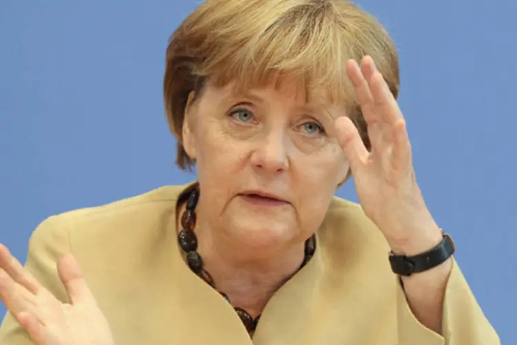 
	Merkel disse ser necess&aacute;rio mais for&ccedil;a para resolver a crise, mas que o compacto fiscal para disciplina or&ccedil;ament&aacute;ria &eacute; um sinal de avan&ccedil;o
 (Sean Gallup/Getty Images)