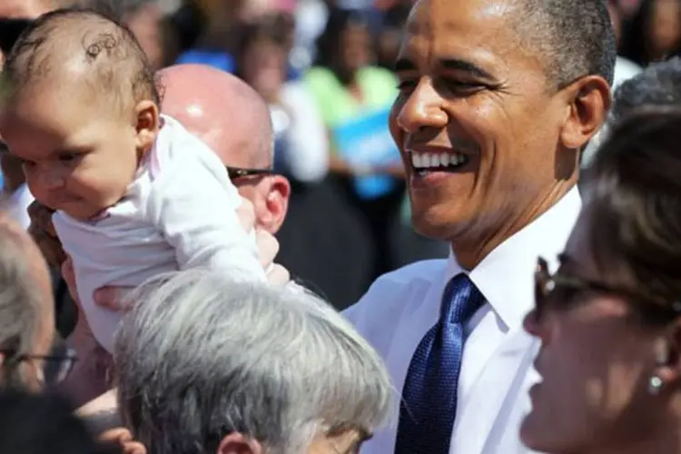 
	Obama em campanha: o presidente americano tamb&eacute;m aparece na frente na Fl&oacute;rida, com nove pontos de vantagem
 (Alex Wong/Getty Images)