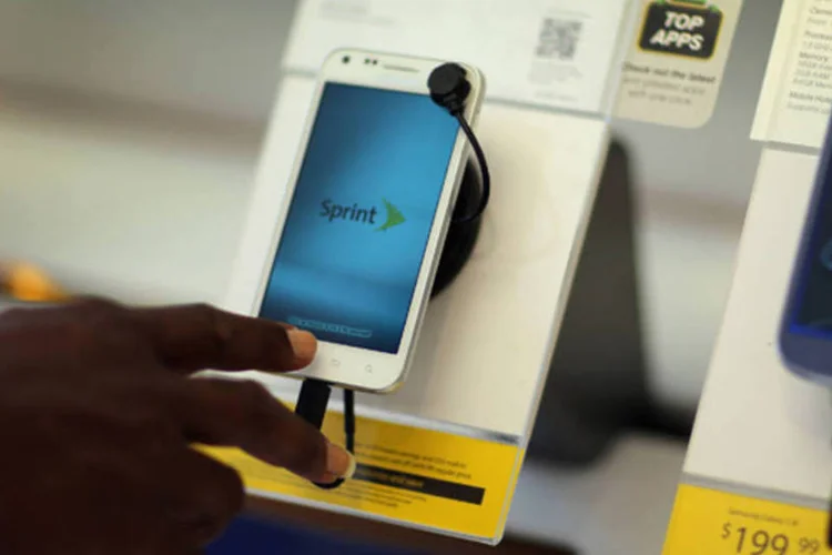 
	Loja da Sprint Nextel em Miami: proposta da Dish &eacute; o mais recente cap&iacute;tulo da reorganiza&ccedil;&atilde;o do setor de telecomunica&ccedil;&otilde;es sem fio dos EUA
 (Joe Raedle/Getty Images)