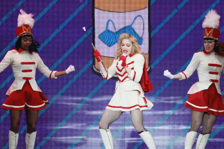 
	Madonna em show da turn&ecirc; &quot;MDNA&quot; em Nova York: n&atilde;o &eacute; a primeira vez que a cantora se atrasa em shows da turn&ecirc; nos EUA
 (Taylor Hill/Getty Images)