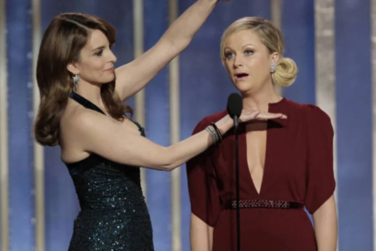 
	Tina Fey e Amy Poehler durante a apresenta&ccedil;&atilde;o do 70&ordf; premia&ccedil;&atilde;o anual do Globo de Ouro:&nbsp;71&ordf; edi&ccedil;&atilde;o do Globo de Ouro acontecer&aacute; neste domingo
 (Paul Drinkwater/NBCUniversal via Getty Images)