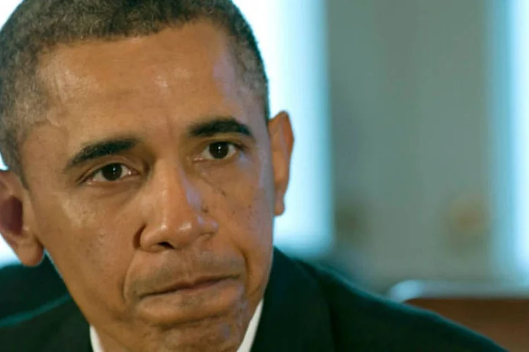 
	Barack Obama: &quot;Devido aos cortes de despesas me cortaram as asas&quot;, brincou o presidente no jantar do Clube Gridiron
 (McNamee/Getty Images)