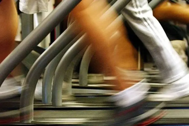 
	Pessoas treinando em academia: para evitar que o estresse tenha impacto negativo na corrida, voc&ecirc; precisa colocar suas sensa&ccedil;&otilde;es em um contexto positivo
 (Getty Images/Spencer Platt)