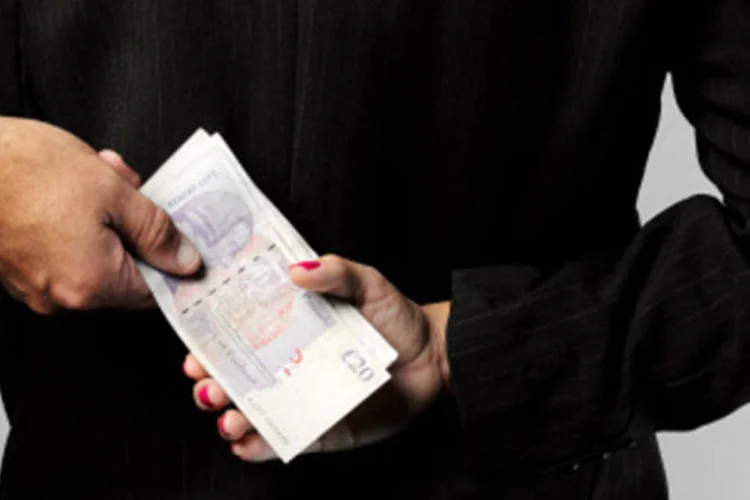 
	Corrup&ccedil;&atilde;o: com nova lei, empresas que fraudarem licita&ccedil;&otilde;es ou subornarem agentes p&uacute;blicos podem ter de pagar multa de at&eacute; 20% de seu faturamento bruto anual
 (Getty Images)