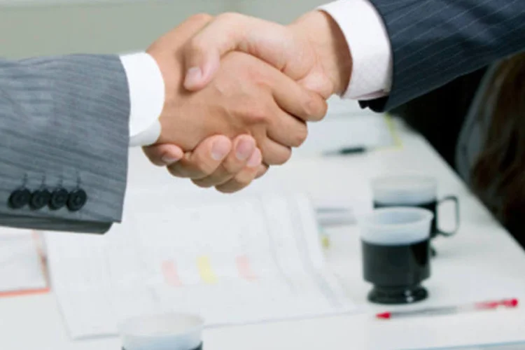 Negócios: duas empresas chegaram a um acordo condicional sobre uma recomendada oferta pública completa a 38,75 euros (Getty Images)