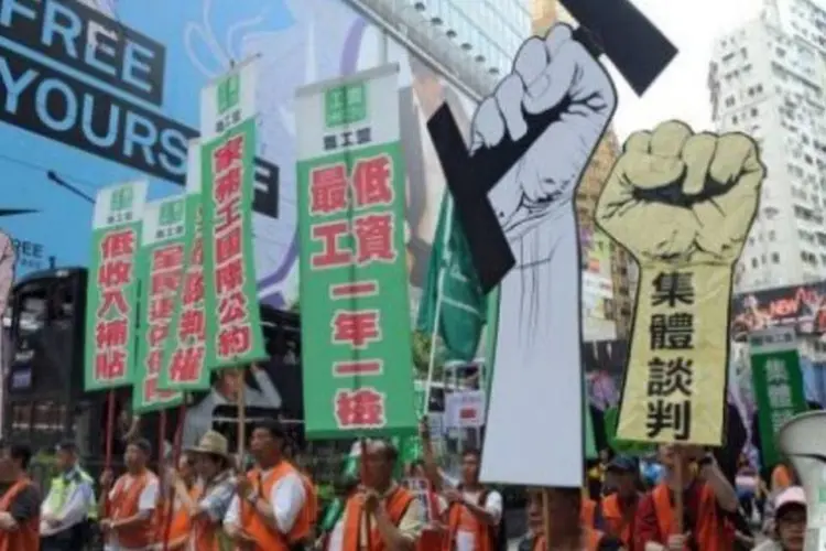 Em Hong Kong, a data significou a entrada em vigor do salário mínimo neste território que pertence à China (AFP)