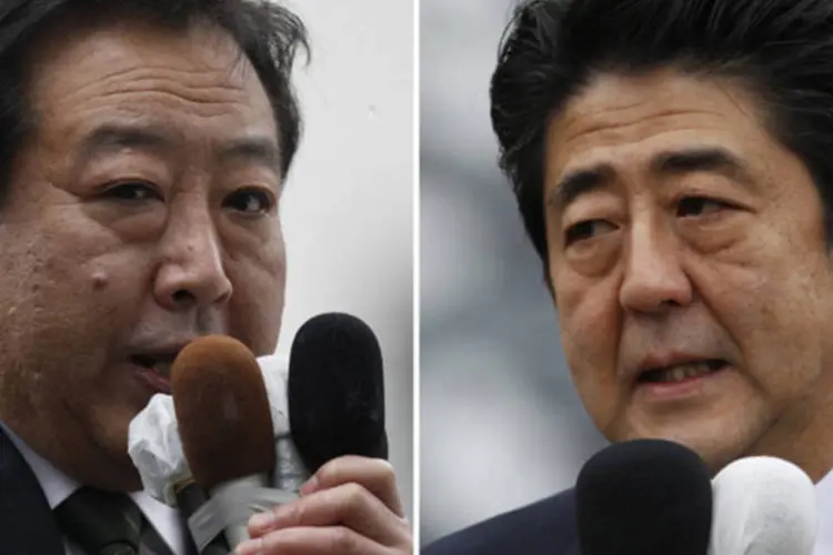
	O primeiro-ministro do Jap&atilde;o, Yoshihiko Noda (e), discursa para os eleitores em campanha em Sendai e Abe Shinzo, enquanto o principal candidato de oposi&ccedil;&atilde;o, Shinzo Abe, fala com eleitores em Fukushima
 (Issei Kato/Reuters)
