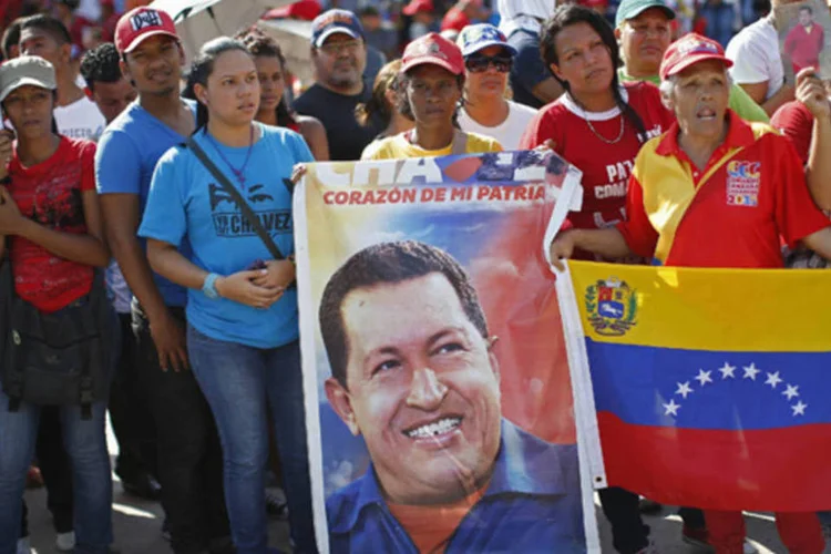 
	Simpatizantes de Hugo Ch&aacute;vez:&nbsp;os jovens venezuelanos interrogados nas ruas de Caracas dois dias ap&oacute;s a morte de seu l&iacute;der onipresente raramente s&atilde;o indiferentes &agrave; etapa que se encerra em seu pa&iacute;s.
 (Jorge Silva/Reuters)
