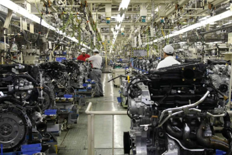 
	F&aacute;brica da Nissan Motor em Iwaki, em Fukushima, no Jap&atilde;o: sentimento econ&ocirc;mico medido junto &agrave;s maiores fabricantes do pa&iacute;s ficou positivo em 5.0 entre abril e junho
 (Chang-Ran Kim/Reuters)