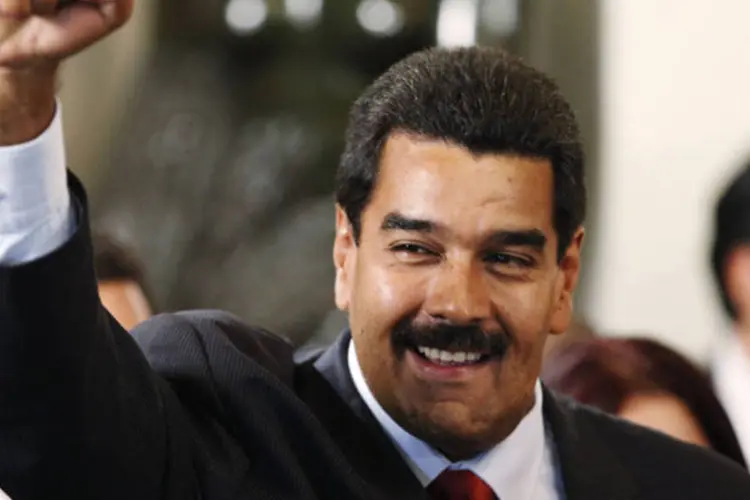 
	Maduro, cujo mandato vai at&eacute; 2019, afirmou que a Venezuela est&aacute; em uma etapa de transi&ccedil;&atilde;o para o socialismo, sistema por meio do qual poder&atilde;o&nbsp;&quot;superar as dificuldades&quot;
 (Enrique Castro-Mendivil/Reuters)