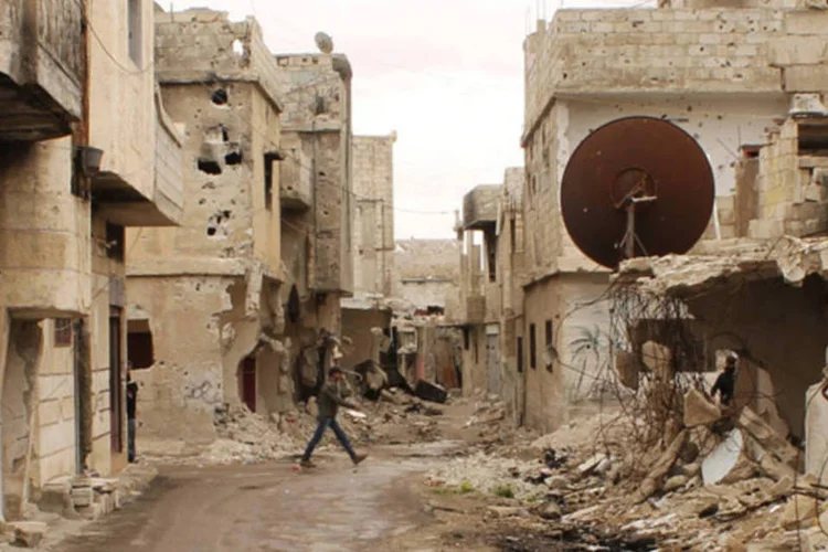 
	Pr&eacute;dio destru&iacute;do em Deraa, na S&iacute;ria
 (Thaer Abdallah)