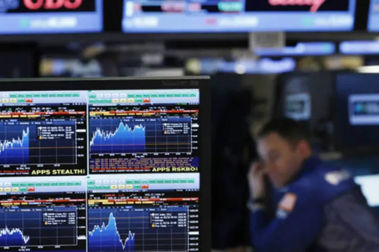 
	Terminal de not&iacute;cias da Bloomberg na Bolsa de Valores de Nova York: investimento em startups
 (Brendan McDermid/Reuters)