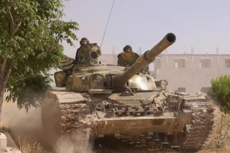Forças aliadas a Bashar al-Assad, presidente sírio, em operação militar contra rebeldes em Alepo, Síria (George Ourfalian/Reuters)