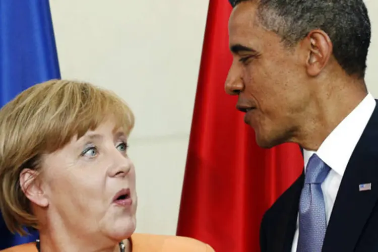 
	Barack Obama e Angela Merkel:&nbsp;presidente do EUA e Alemanha&nbsp;&quot;acordaram em continuar sua estreia coopera&ccedil;&atilde;o em quest&otilde;es-chave de preocupa&ccedil;&atilde;o global e regional&quot;
 (Kevin Lamarque/Reuters)