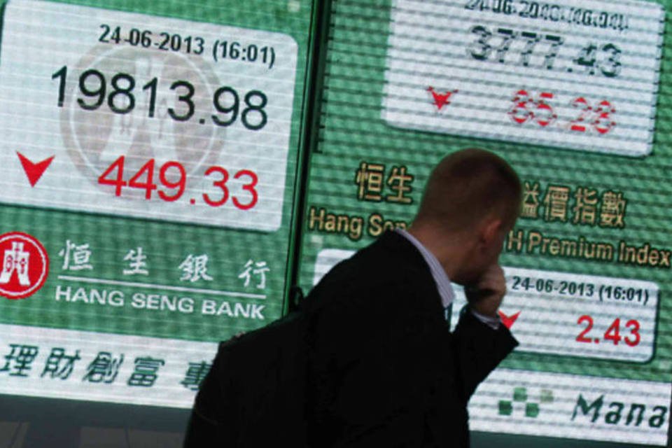 China alivia aperto monetário, mas ações de bancos sofrem