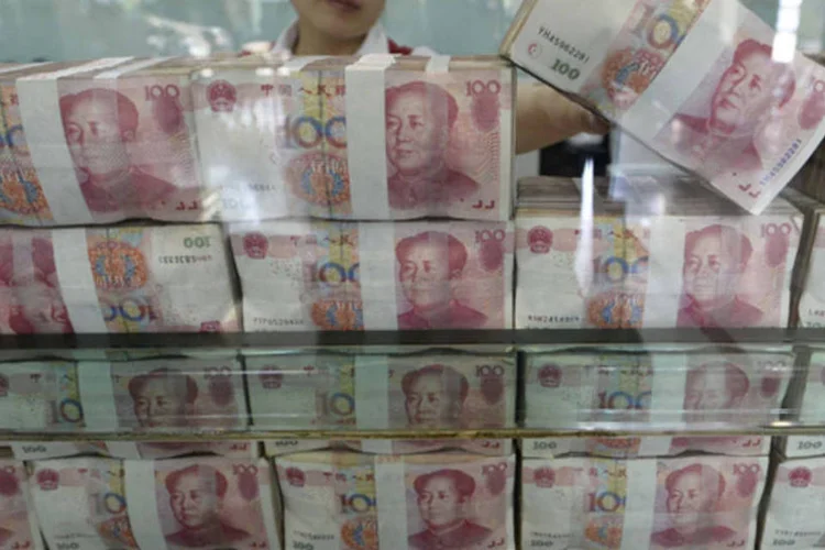 
	&Agrave;s 7h45 o &iacute;ndice MSCI que re&uacute;ne a&ccedil;&otilde;es da regi&atilde;o &Aacute;sia-Pac&iacute;fico com exce&ccedil;&atilde;o do Jap&atilde;o ca&iacute;a 0,6%; &iacute;ndice acumula alta de 2,1% at&eacute; agora neste m&ecirc;s
 (Jon Woo/Reuters)