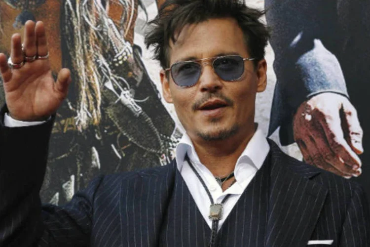
	Ator Johnny Depp: ele voou para a Austr&aacute;lia levando seus Yorkshire terriers, Pistol e Boo, em seu jato particular, sem declar&aacute;-los &agrave; alf&acirc;ndega
 (Mario Anzuoni/Reuters)
