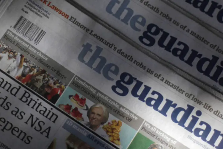 
	C&oacute;pias do jornal The Guardian em Londres: jornal revelou programas secretos de monitoramento dos EUA e Gr&atilde;-Bretanha
 (Suzanne Plunkett/Reuters)