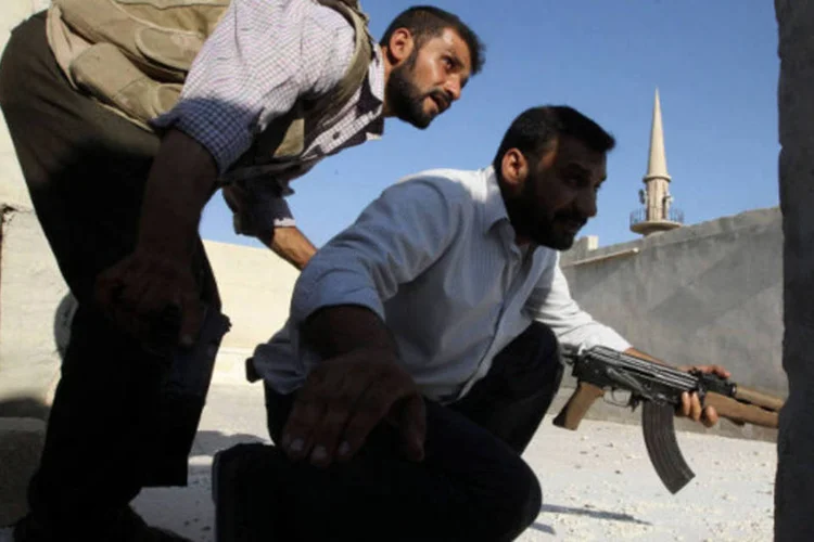 
	Rebeldes do ex&eacute;rcito livre da S&iacute;ria :&nbsp;jornalista espanhol Marc Marginedas&nbsp;est&aacute; em poder de um grupo de rebeldes s&iacute;rios desde o dia 4 deste m&ecirc;s
 (Muzaffar Salman/Reuters)
