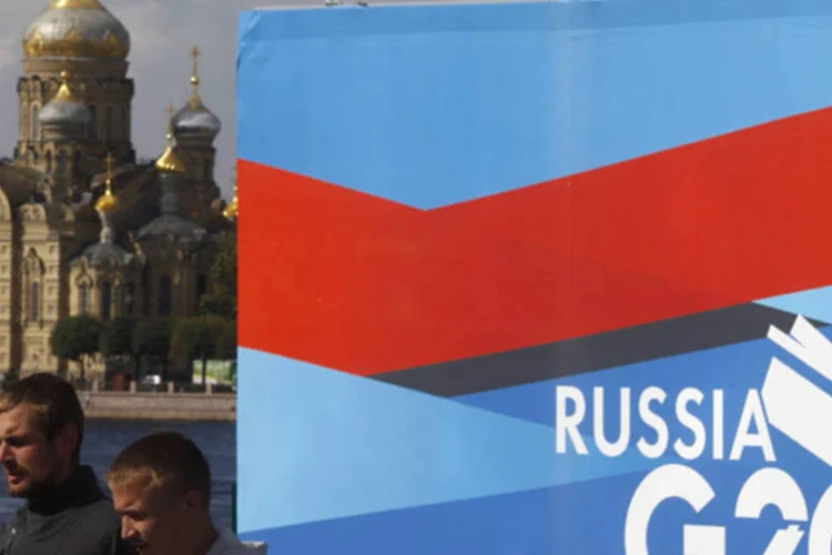 
	Faixa da c&uacute;pula do G20: n&atilde;o h&aacute; racha maior do que a diferen&ccedil;a entre EUA e R&uacute;ssia sobre uma poss&iacute;vel interven&ccedil;&atilde;o militar na S&iacute;ria para punir o presidente por um ataque com armas qu&iacute;micas
 (Alexander Demianchuk/Reuters)