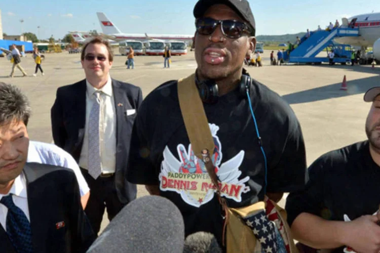 Extravagante ex-jogador de basquete Dennis Rodman chegou nesta terça-feira à Coreia do Norte para uma visita de cinco dias, a segunda neste ano (Kyodo/Reuters)