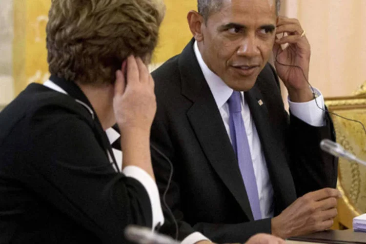 Presidente americano sento ao lado de Dilma Rousseff durante a reunião inaugural da cúpula do G20 na Rússia (Pablo Martinez Monsivais/Reuters)