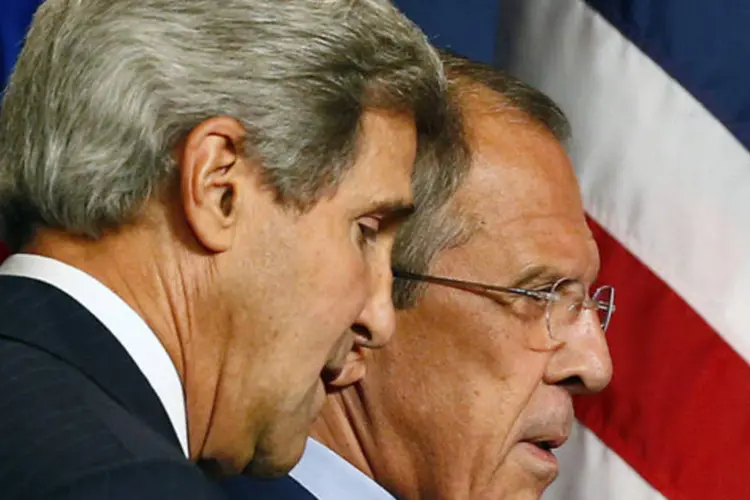 Secretário de Estado norte-americano, John Kerry, e o chanceler russo, Sergei Lavrov, após reunião em Genebra (Ruben Sprich/Reuters)