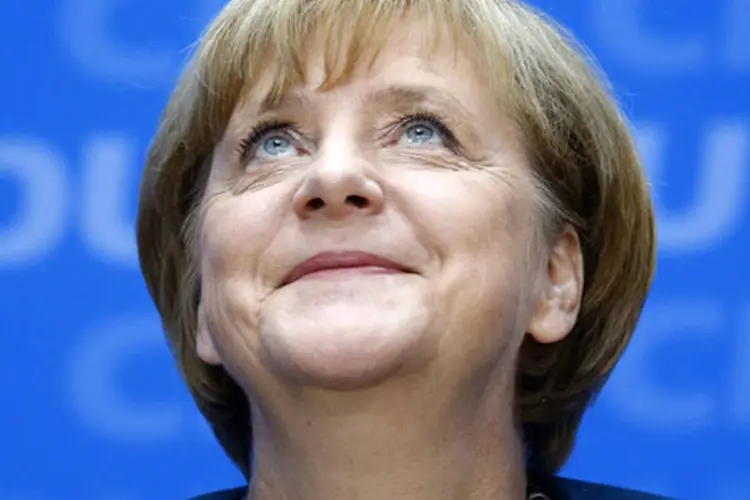 Chanceler alemã Angela Merkel é vista durante coletiva de imprensa após reunião de seu partido, em Berlim (Kai Pfaffenbach/Reuters)