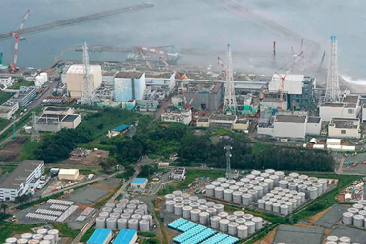 
	Vista a&eacute;rea da Usina de Fukushima:&nbsp;um grande n&uacute;mero de part&iacute;culas radioativas foi liberado na atmosfera, diz estudo
 (REUTERS/Kyodo/Files)