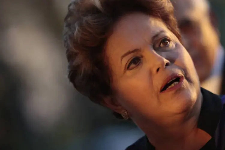 
	Dilma Rousseff: Dilma embarcou nesta sgeunda-feira, 9, para a &Aacute;frica do Sul ao lado de Jos&eacute; Sarney, Fernando Collor, Fernando Henrique Cardoso e Luiz In&aacute;cio Lula da Silva
 (Ueslei Marcelino/Reuters)