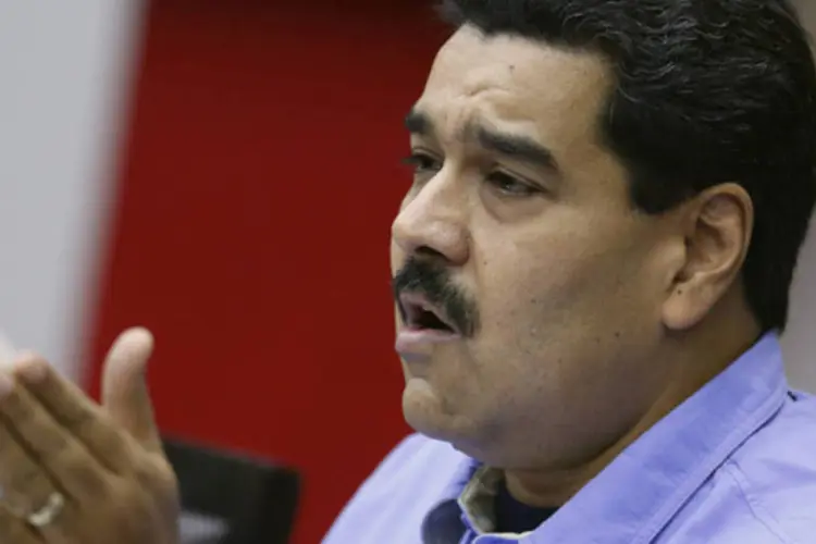 
	Nicol&aacute;s Maduro: ele apelou &quot;aos jovens que integram grupos violentos para cessar com os crimes j&aacute;&quot;
 (Carlos Garcia Rawlings/Reuters)