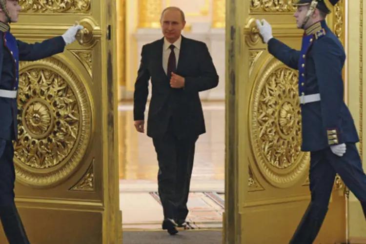 Vladimir Putin em evento anual no Kremilin: "temos que ser claros: os principais motivos para a desaceleração econômica não são externos, mas internos" (Mikhail Klimentyev/Reuters)