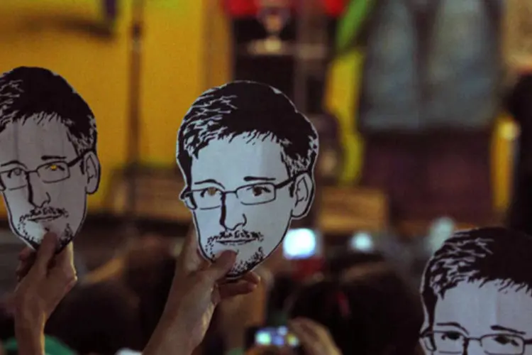 Manifestantes pedem à Dilma Rousseff que conceda asilo permanente para o ex-técnico da NSA Edward Snowden (Paulo Whitaker/Reuters)