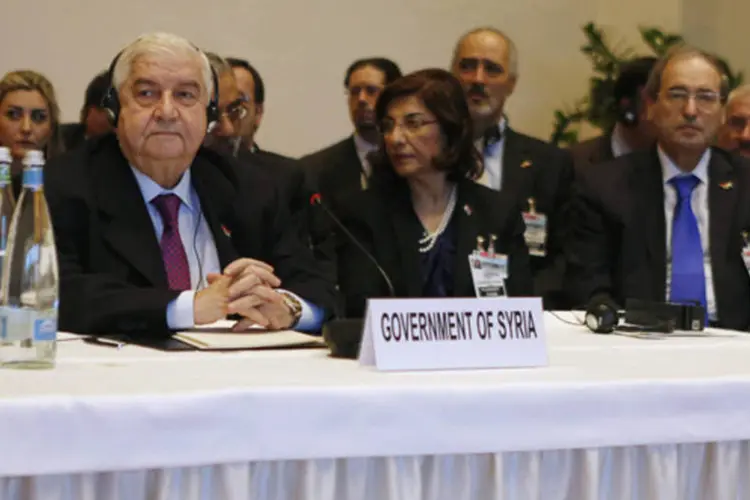 Chanceler sírio, Walid al-Moualem, durante sessão plenária da conferência internacional de paz sobre a Síria, em Montreux, na Suíça (Gary Cameron/Reuters)