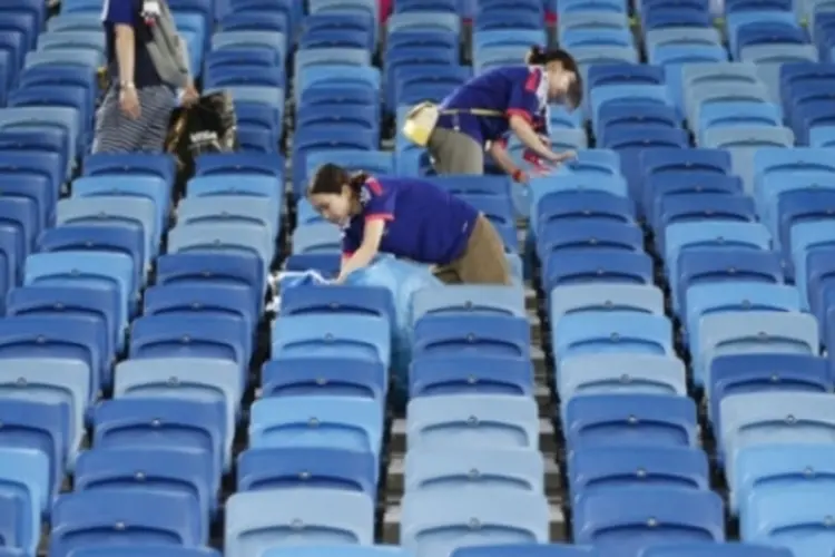 Japoneses no estádio (Getty Images)
