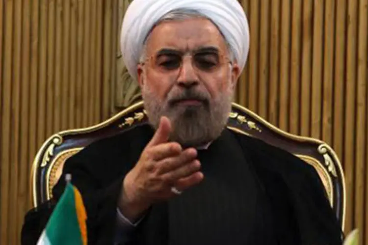 
	Hassan Rouhani: &quot;por causa da falta de agentes influentes na reuni&atilde;o, tenho d&uacute;vidas sobre o sucesso de Genebra 2 em lutar contra o terrorismo... e sua capacidade para resolver a crise na S&iacute;ria&quot;
 (Atta Kenare/AFP)