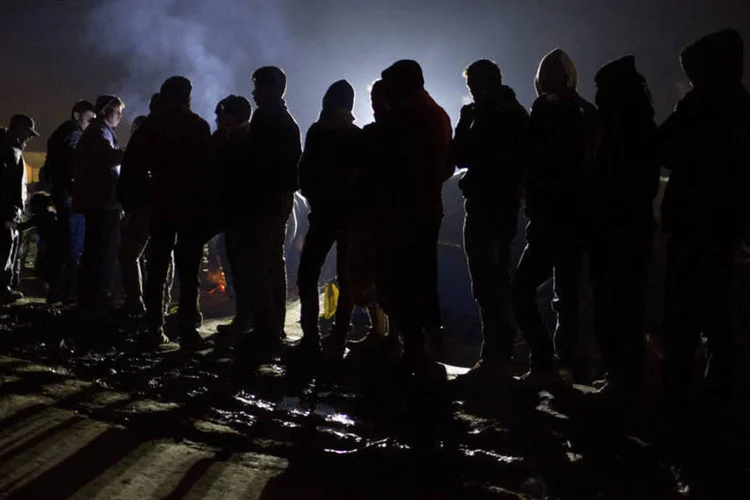 
	Refugiados: nesta semana, segundo seus n&uacute;meros, chegaram &agrave; Fran&ccedil;a 97 refugiados procedentes da Gr&eacute;cia e It&aacute;lia, que foram dirigidos a centros de amparo e alojamento
 (Bloomberg/Kostas Tsironis)